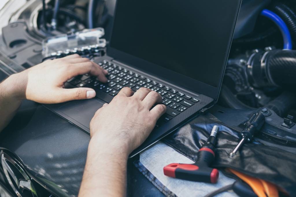 DIY car ECU tuning with a laptop: Learn how to adjust your car's engine control unit for enhanced performance.