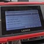 Launch CRP 129X weekend car racing ECU reader, showcasing its user-friendly touchscreen interface for easy diagnostics.