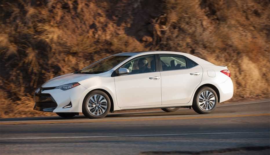 white Toyota Corolla