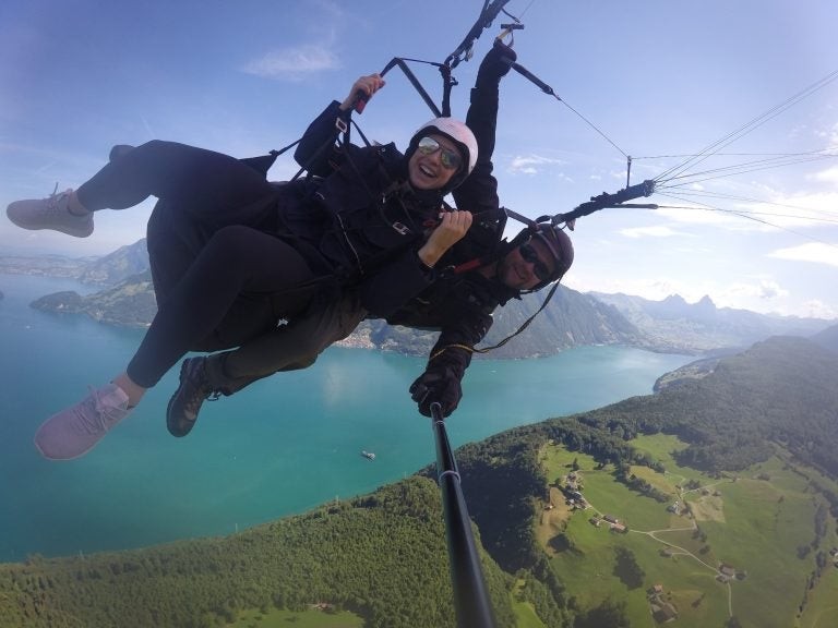 Paraglider Marianna Shurina enjoys the view over Lake Luzern.