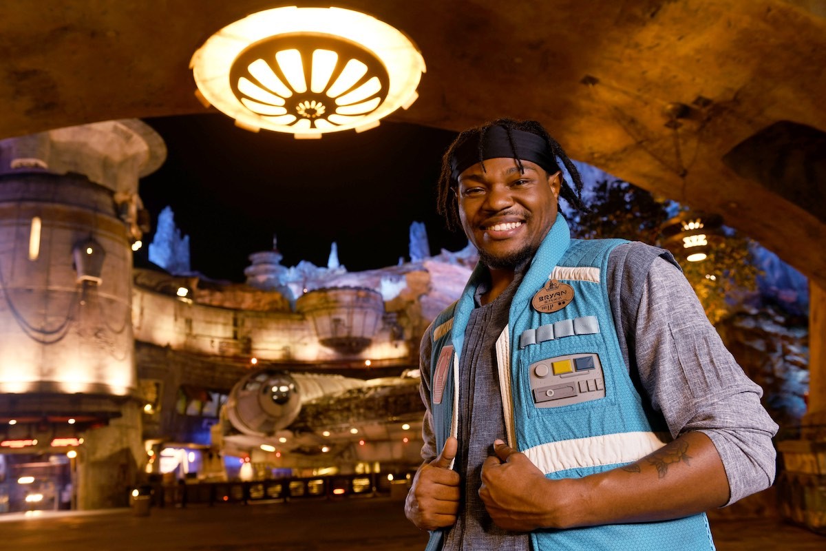 Disney College Program participant Bryan amidst Star Wars attractions, highlighting diverse career experiences.