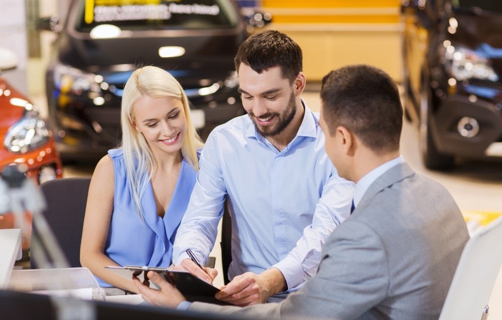 Confident customer getting car loan for credit repair