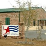 Exterior view of an Alabama Career Center building, emphasizing accessibility and community focus for free career training programs.