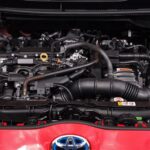 Engine bay of a car showing various components